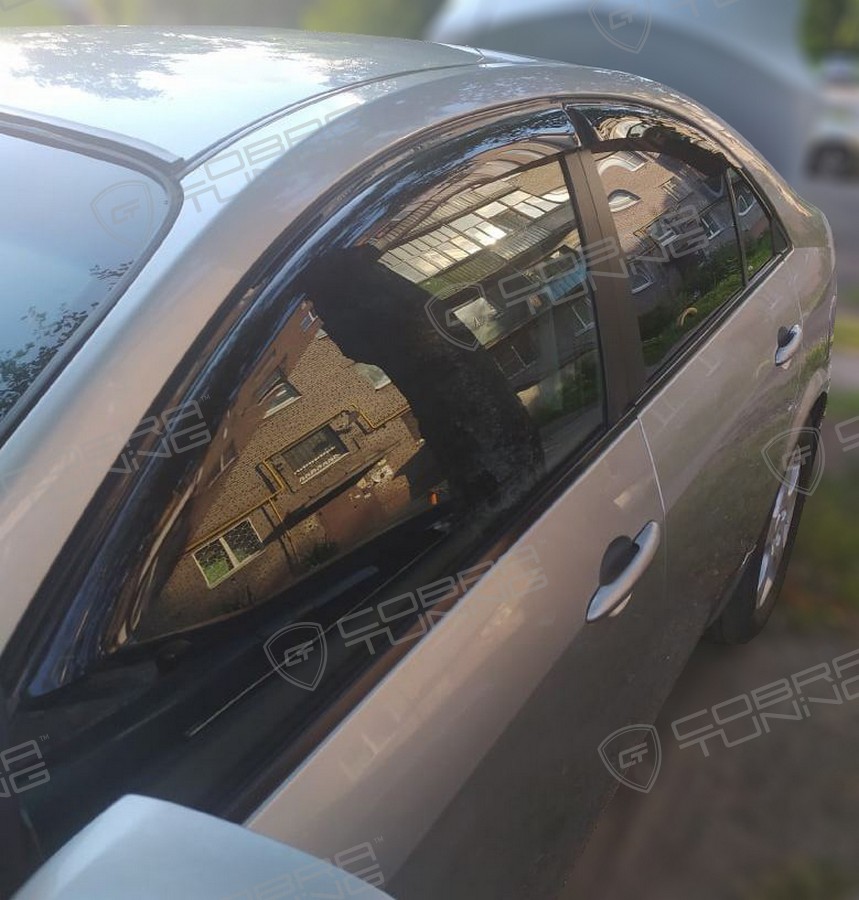 Отзыв - дефлекторы Кобра Тюнинг на окна Ниссан Примера 2002 седан